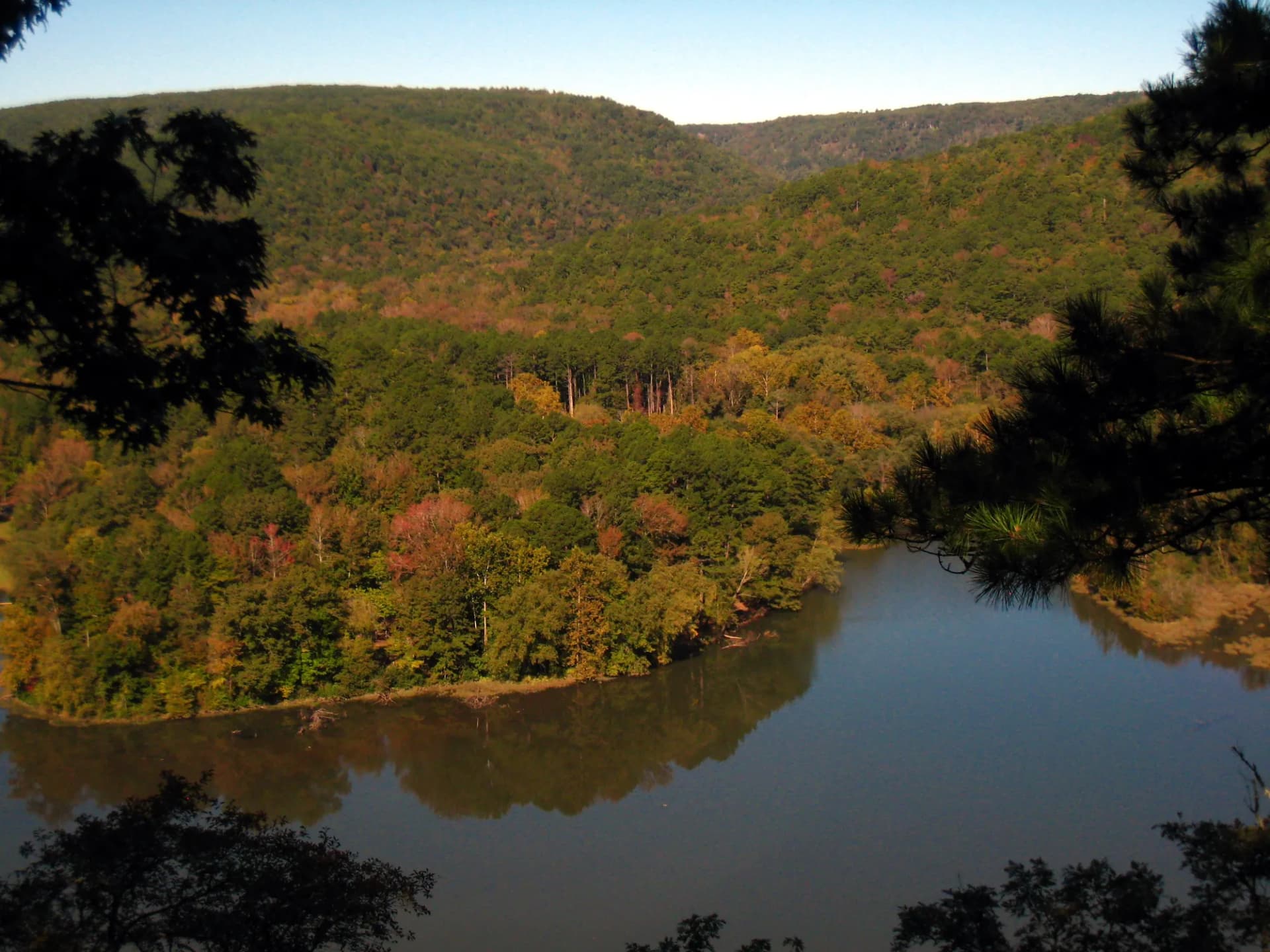 Shores Lake surrounded by hardwood and pine forest in Ozark National Forest, Arkansas