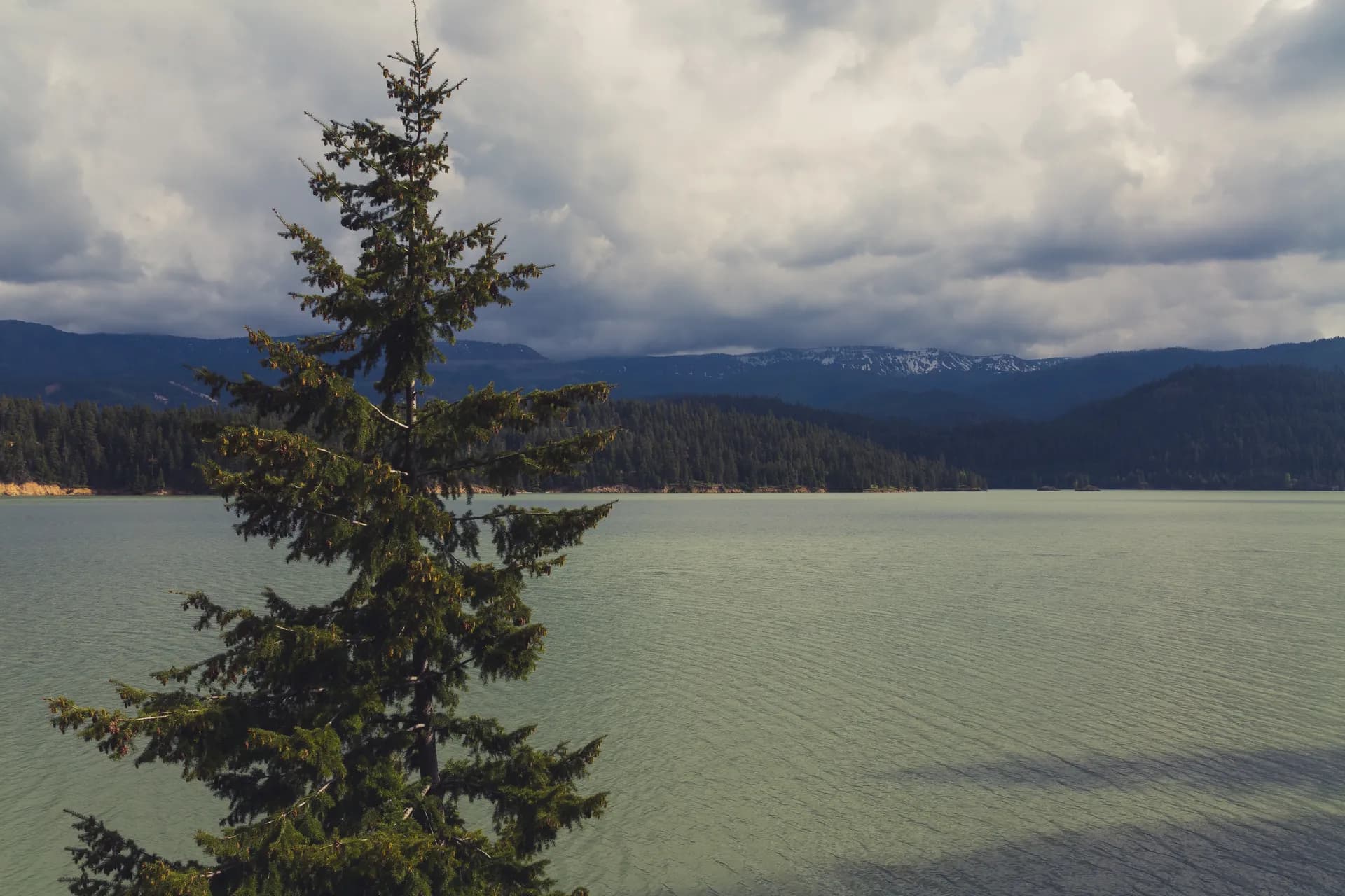 Rimrock Lake reflecting the Cascade Range in Mount Baker-Snoqualmie National Forest, Washington