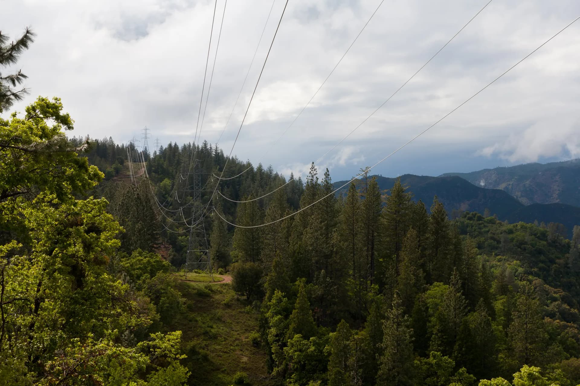 Mixed conifer forest covering Sierra Nevada foothills from the Rim of the World vista on CA-120, Stanislaus National Forest, California