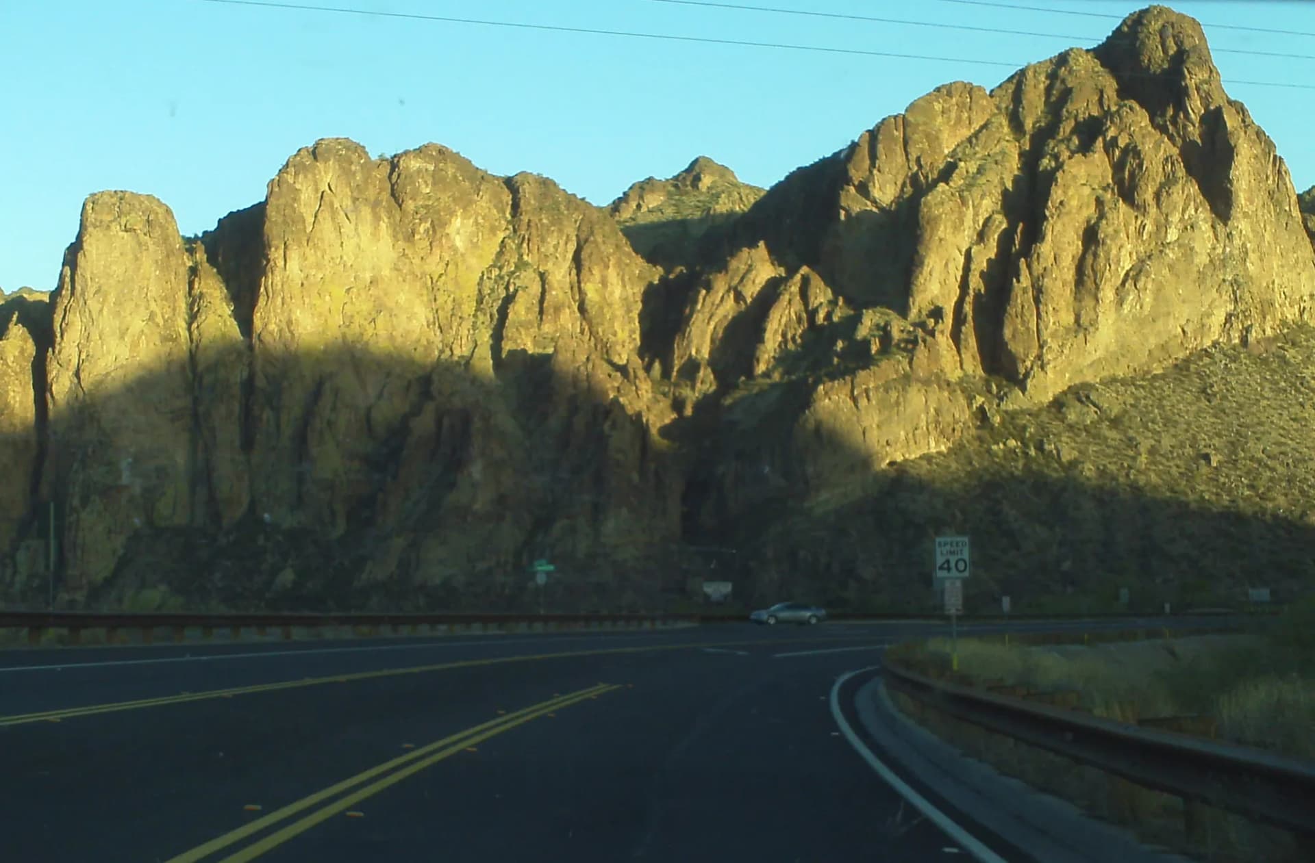 Rugged desert mountains rising above Sonoran Desert scrubland in Tonto National Forest, Arizona